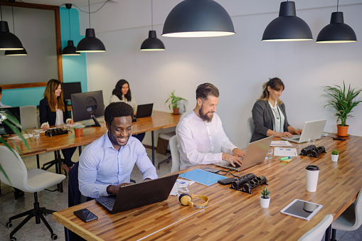 Global SF Logistics team collaborating in a modern office